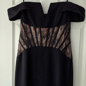 Strapless gown with corset detail.